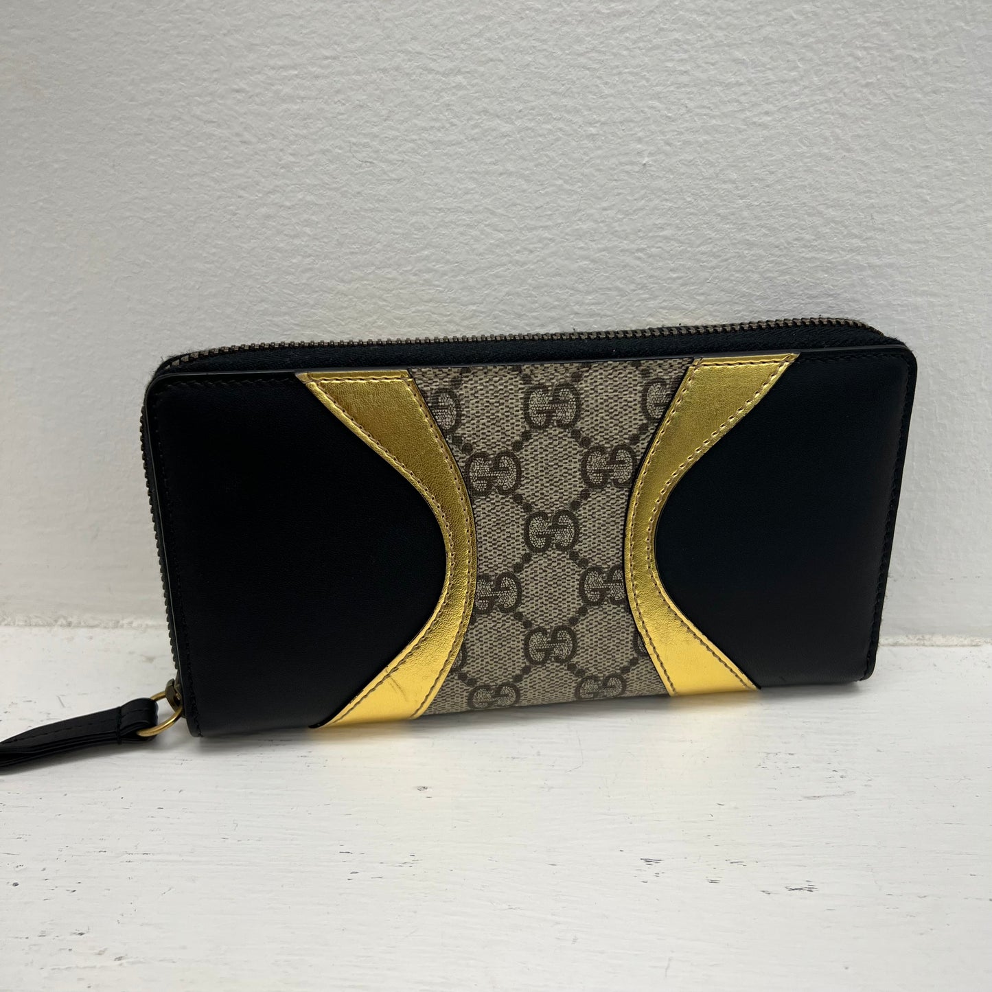 Gucci Zip Wallet Monogram and Gold