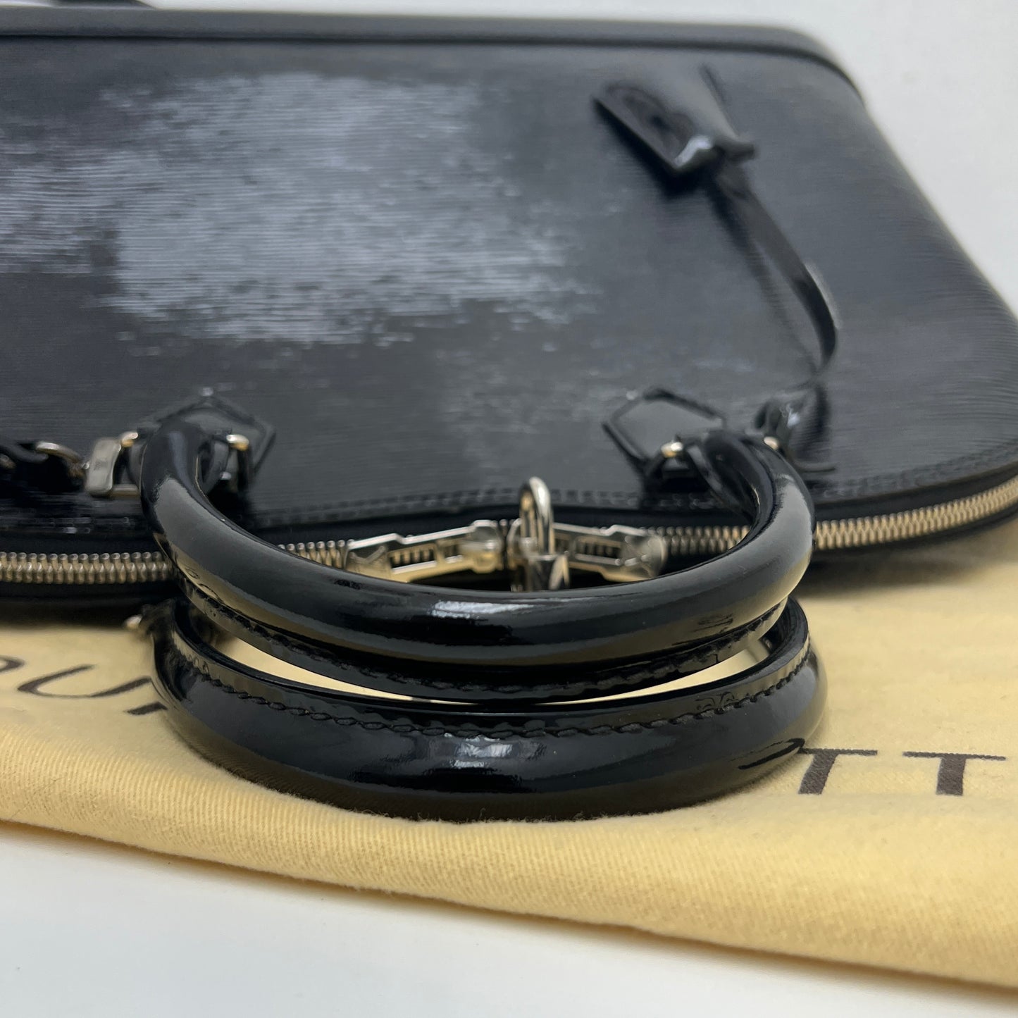 Louis Vuitton Alma Gm Black Epi Electric Patent