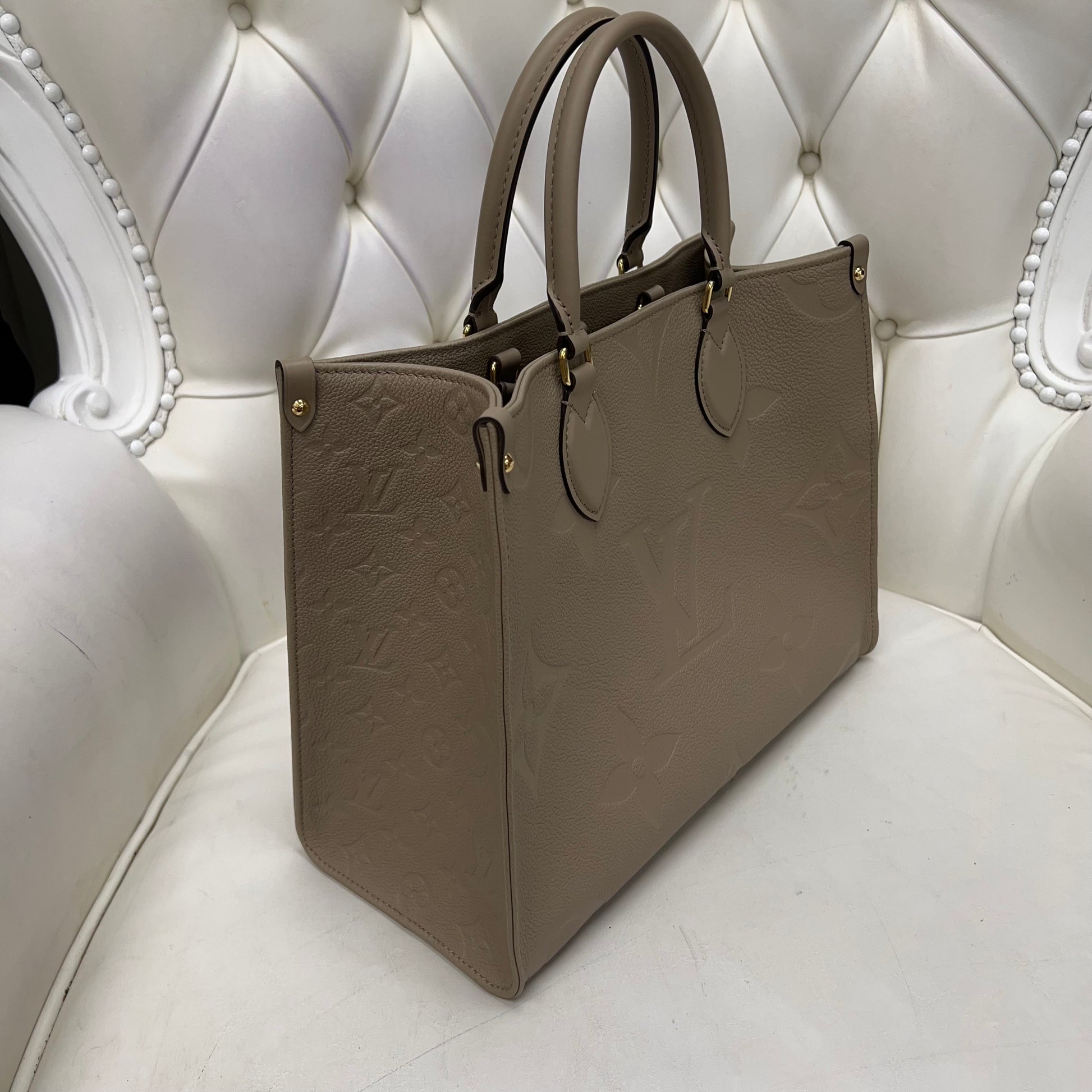 Louis Vuitton On the Go MM Turtle Dove Empreinte Leather – J'Adore Wakefield