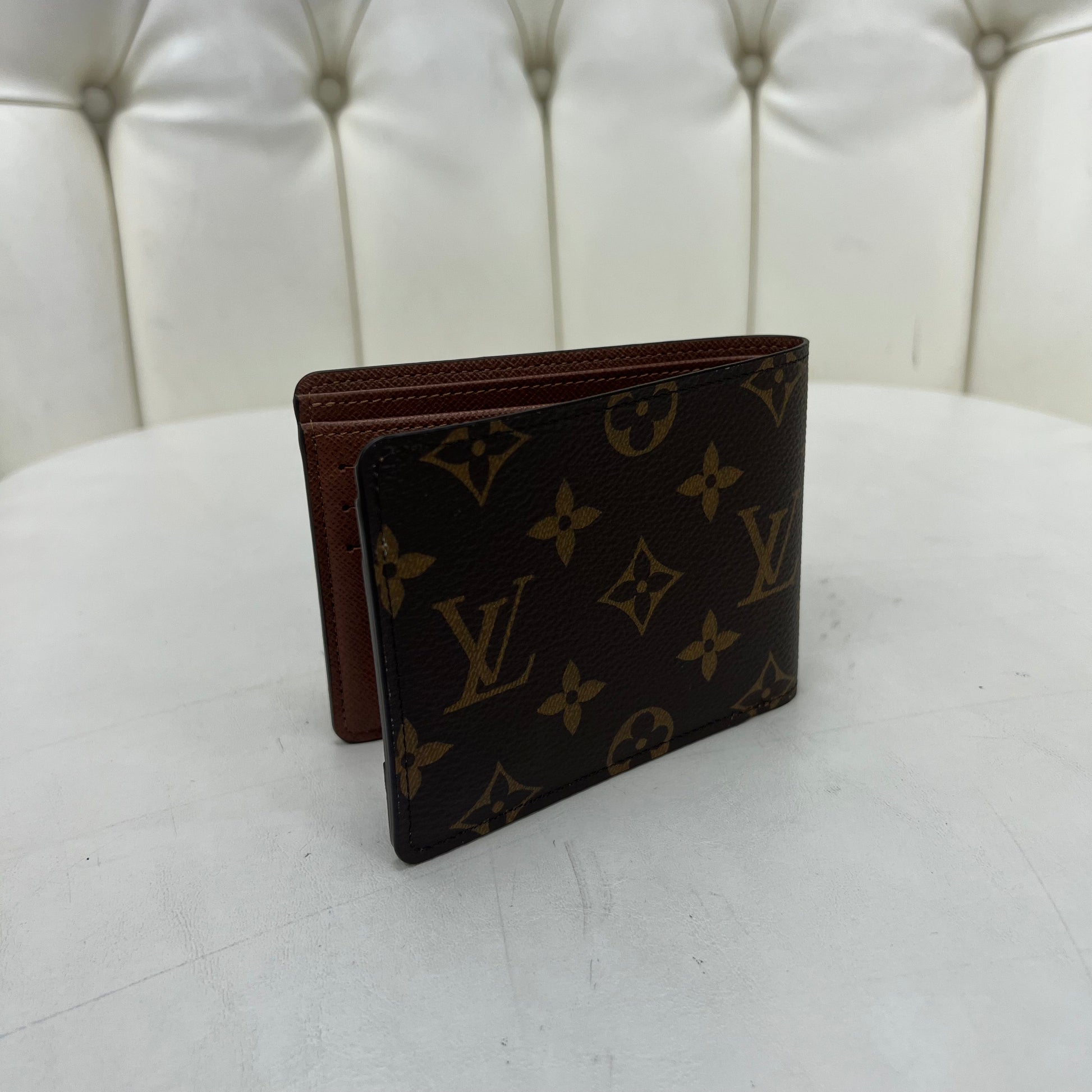 Louis Vuitton Portefeuille Multiple in Brown